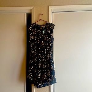 Navy dress with floral leaf pattern